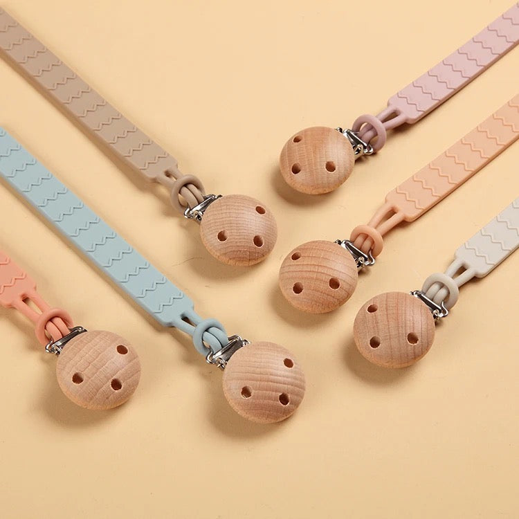Silicone matching pacifier clip and holder