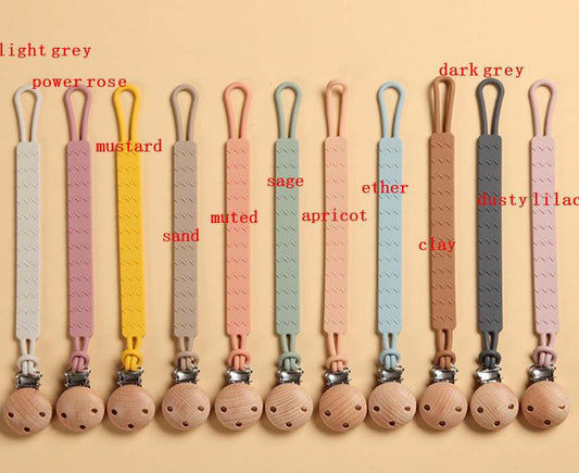 Silicone matching pacifier clip and holder