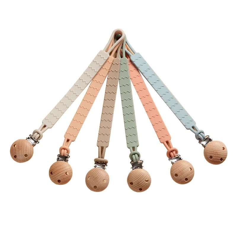 Silicone matching pacifier clip and holder
