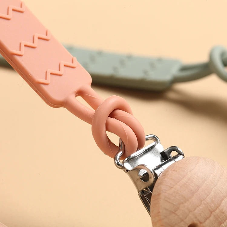 Silicone matching pacifier clip and holder